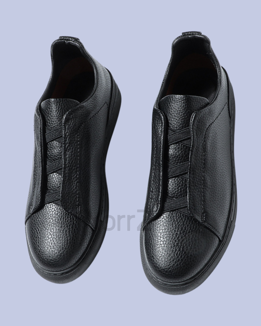 The Black Triple Stitch Slip-On Low-Top Sneakers