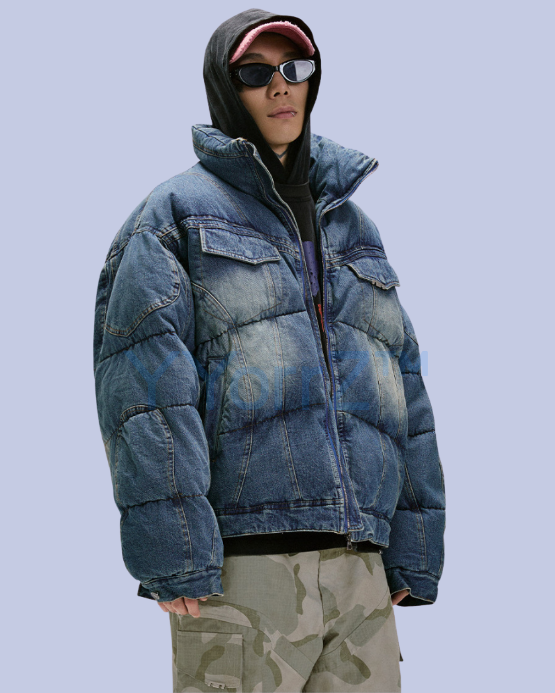 A model wearing the Washed Vintage Denim Puffer Jacket